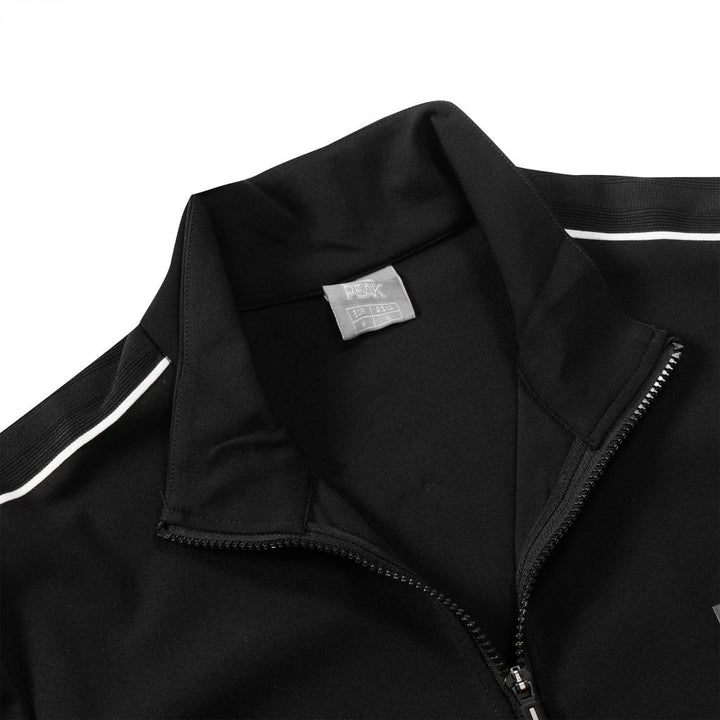 Détail du pantalon du survêtement PEAK noir homme