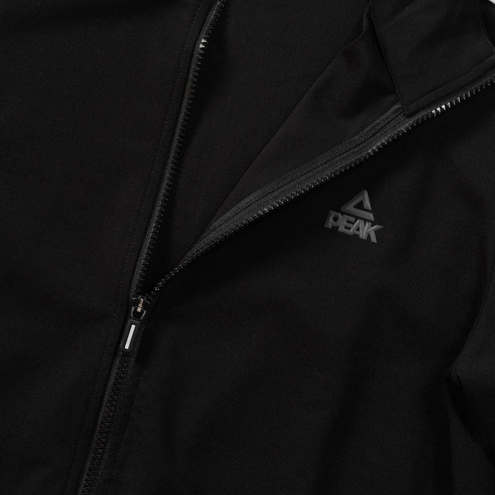 Détail de la veste du survêtement PEAK noir homme