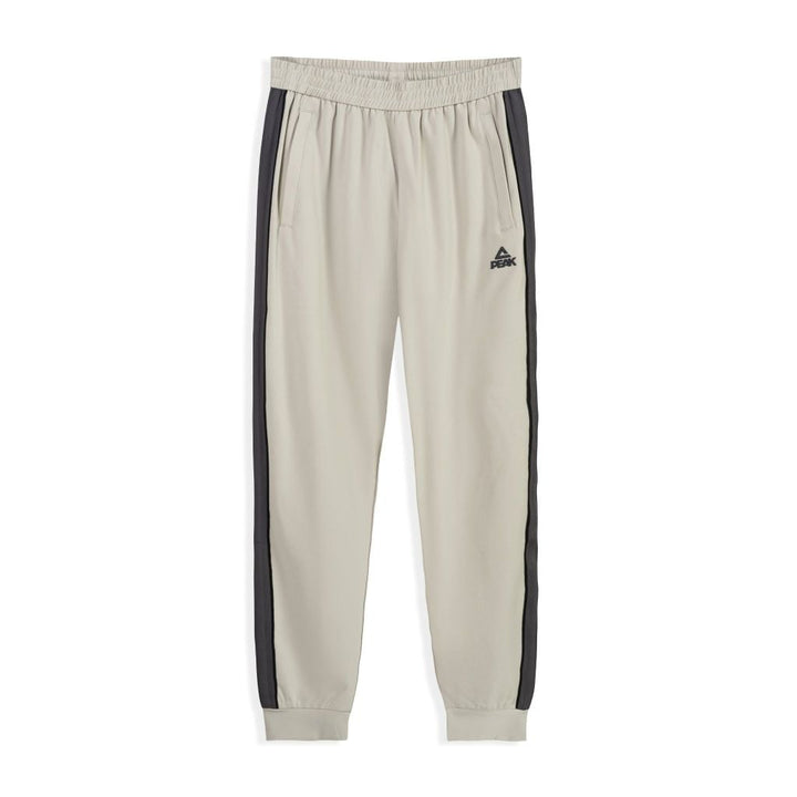 Logo PEAK sur ensemble survêtement gris homme